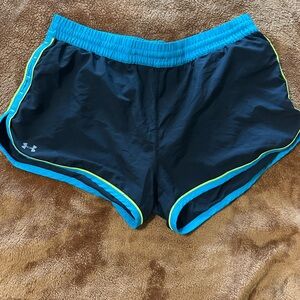 Under Armour Black and Blue Athletic Shorts with Curved Hem